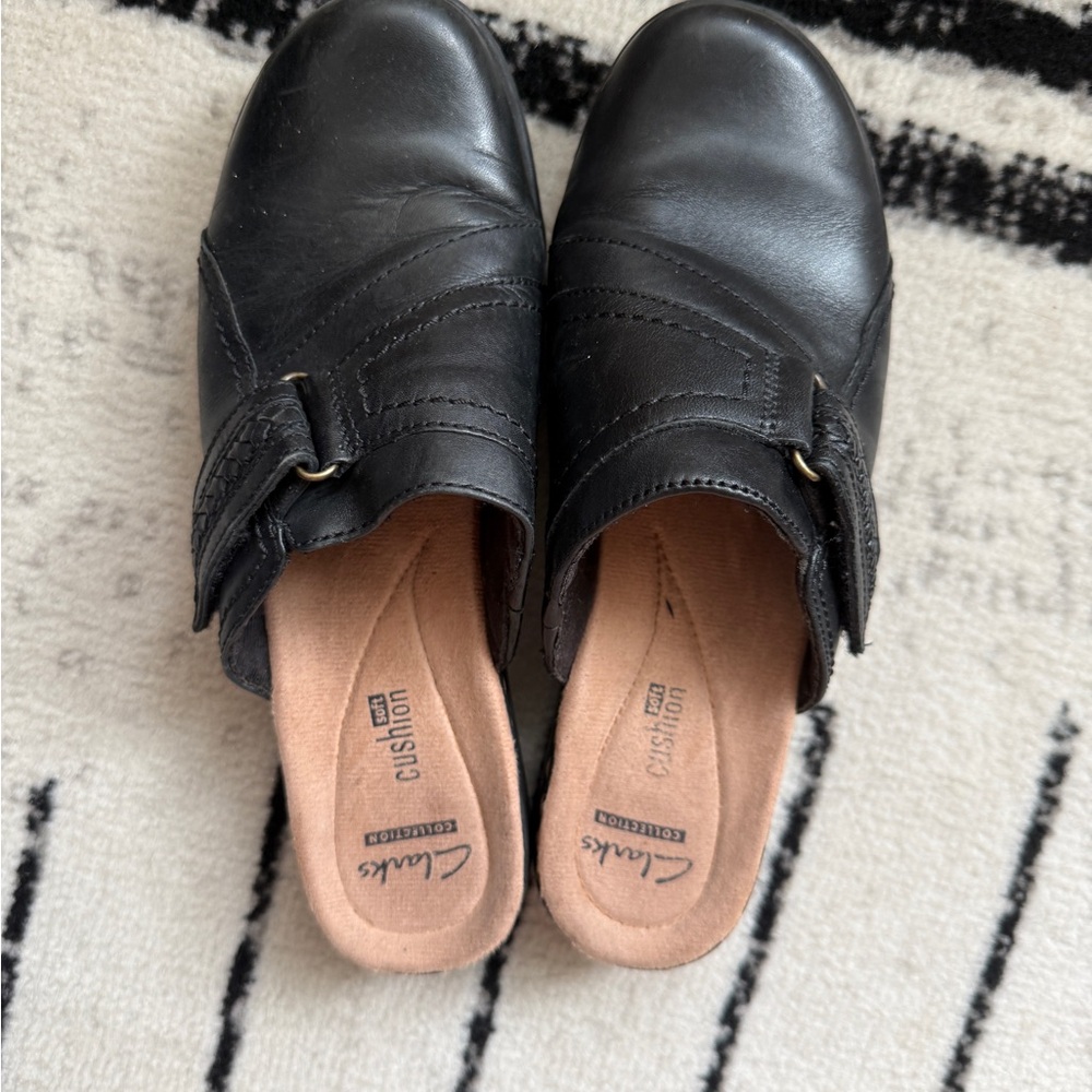 Clarks Black Mules Sleek Comfortable Design